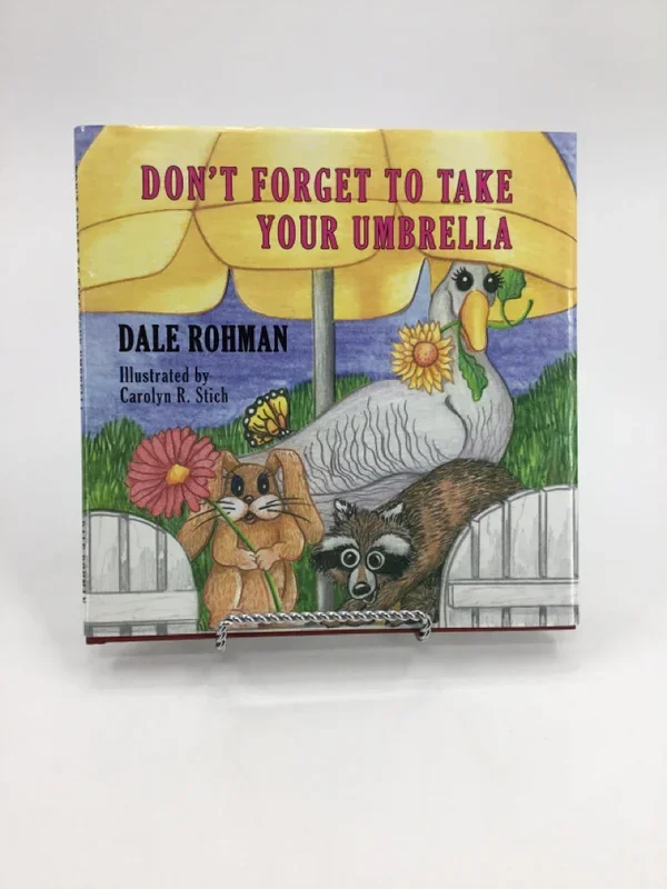 Don’t Forget To Take Your Umbrella Hardback Book